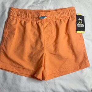 Art class mid-thigh length orange Size L (10/12). Made in Vietnam. 100% Nylon.